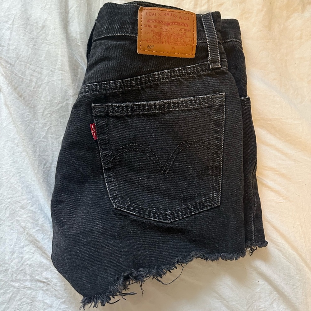 Black ripped Levi 501 denim short